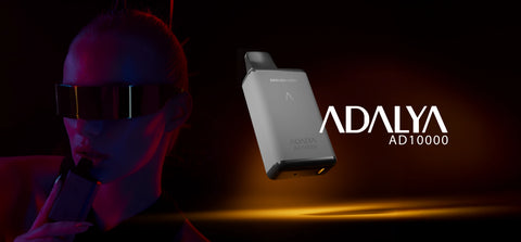 Person wearing sunglasses with a dark background, featuring the Adalya AD10000 device.